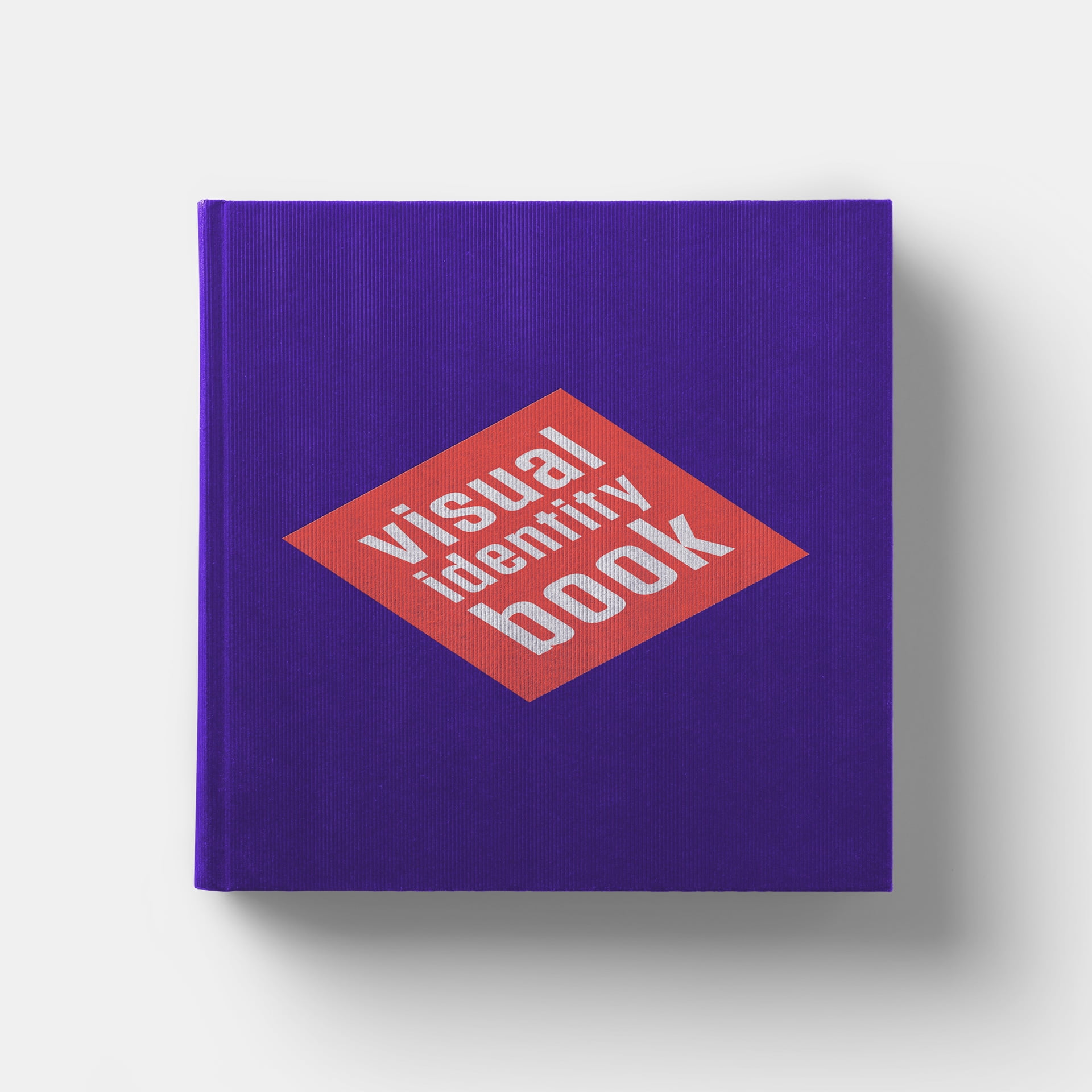 Identity Book omslag in het paars met koraalrode titel